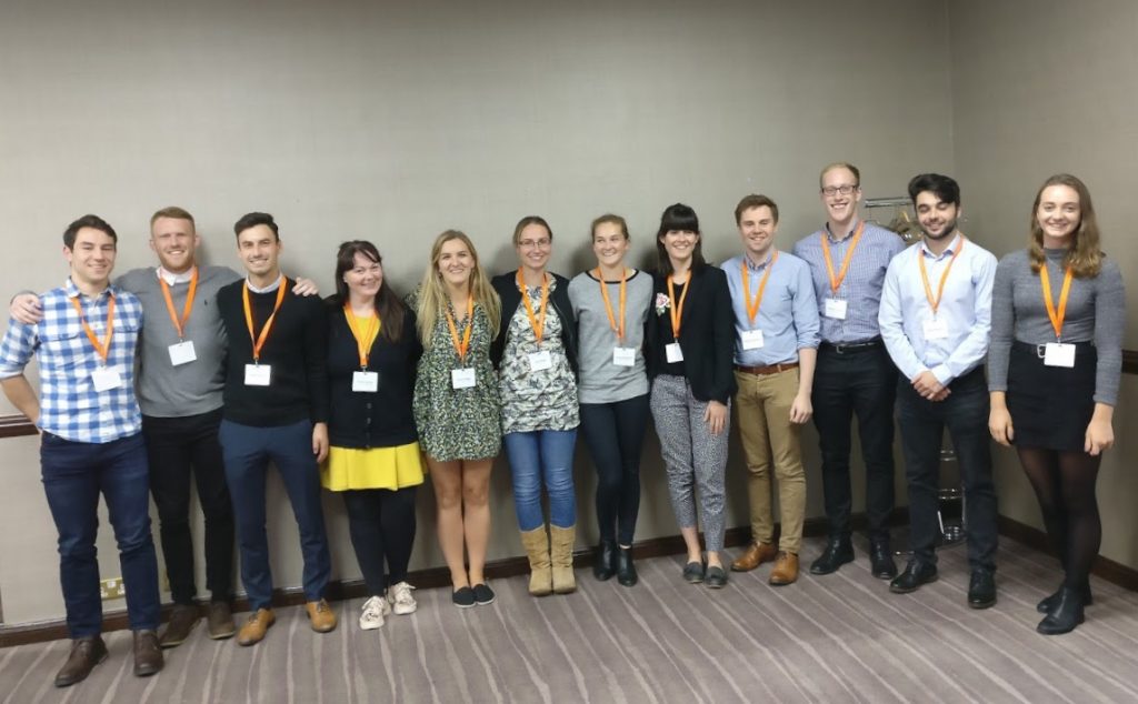 Image: Claire with other interns at the BASEM conference