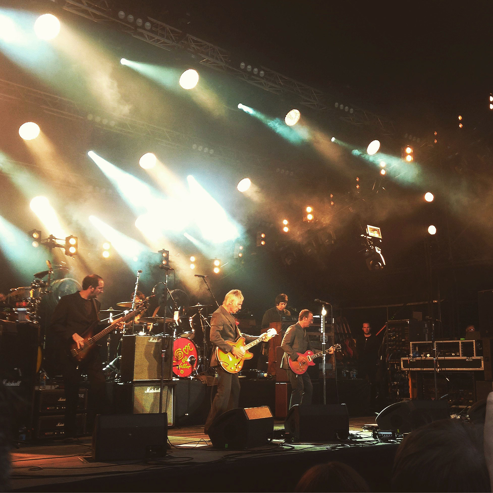 Photograph of musician Paul Weller and his band, taken from 