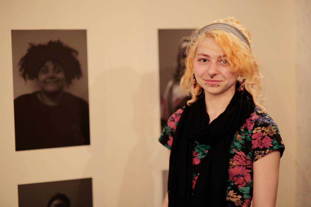 Image: Salford University student Alena Donely portrait with her visual arts work