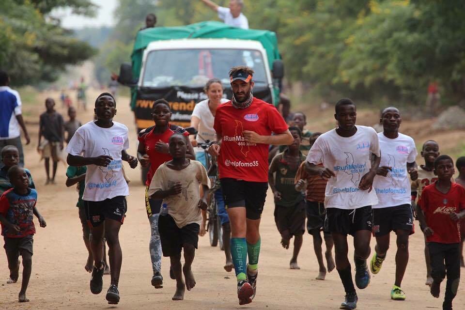 image: salford fashion graduate marathon runner brendan rendall fund raising money for Africa 