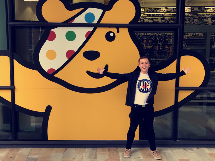 Image: Rhys and Pudsey Bear. 
