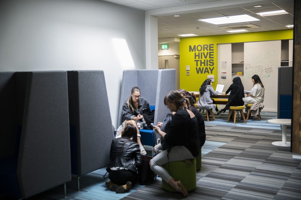 Students sat in the B'hive study spaces. 