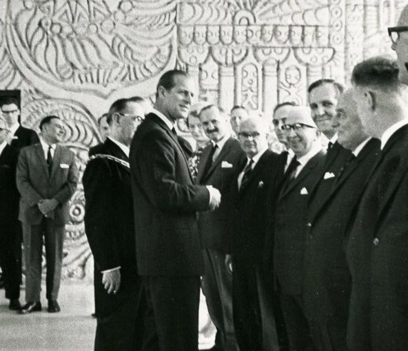 Prince Philip greeting dignitaries inside Salford Technical College