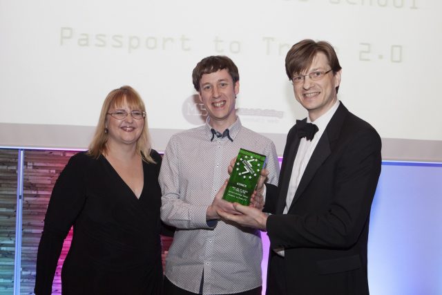 PHOTO: Shari Thurow, Founder of Omni Marketing presents the award to Alex Fenton and Aleksej Heinze.