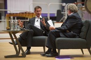 Rt Hon Jeremy Hunt MP, Secretary of State for Culture, Media, Olympics and Sport, (left) with session chair Steve Hewlett at the Nations & Regions Media Conference at the BBC Philharmonic Studio at MediaCityUK on 12 March 2012.