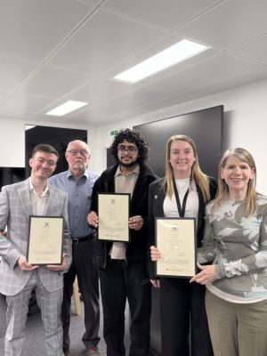 Salford students Jibraeel Ali, David Egan and Luca Oakes with Fleur Middlebrough, Subject Group Head and Senior Lecturer in Accounting at Salford Business School, and their David Illingworth Awards