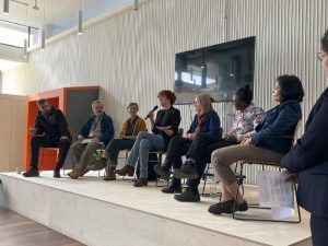 A panel discussion happening at the Manchester Unhackathon in the Sister building