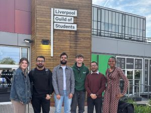 Salford students stood outside the Liverpool Guild of Students building.