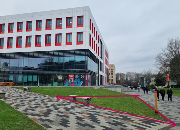 Garden space outside the SEE building, Peel Park Campus, with pink arrows to show where the new community garden will be located.