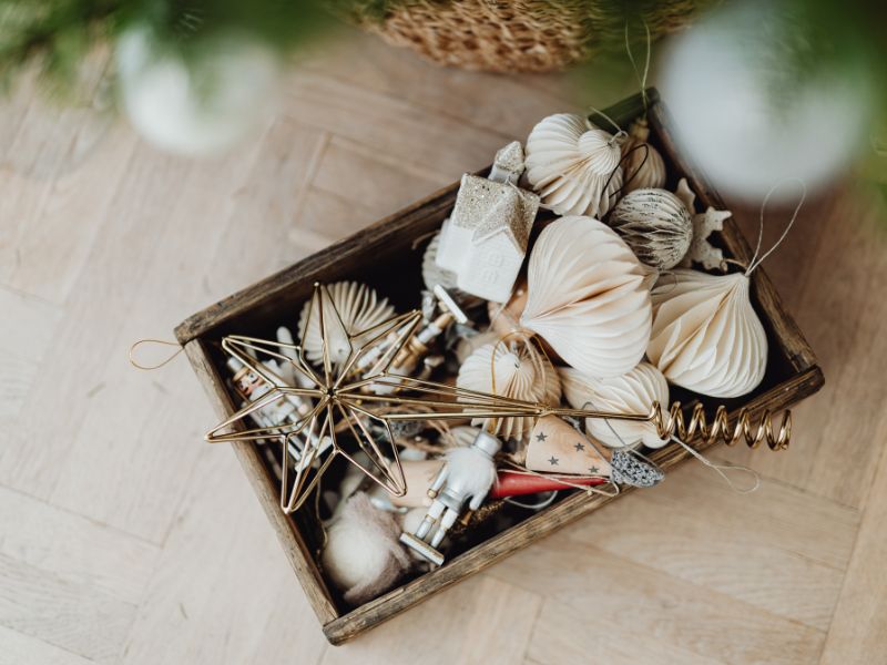 A box of handcrafted festive decorations.