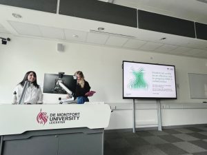 Two women stood in a lecture room at De Montford University.