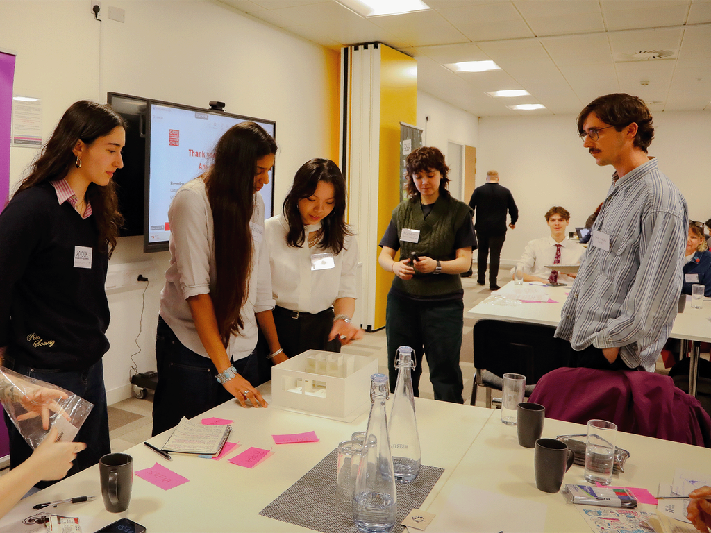 Groups of students working on a project