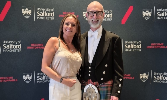 Gail Hadfield Grainger posing for a photo with Vice-Chancellor Nic Beech