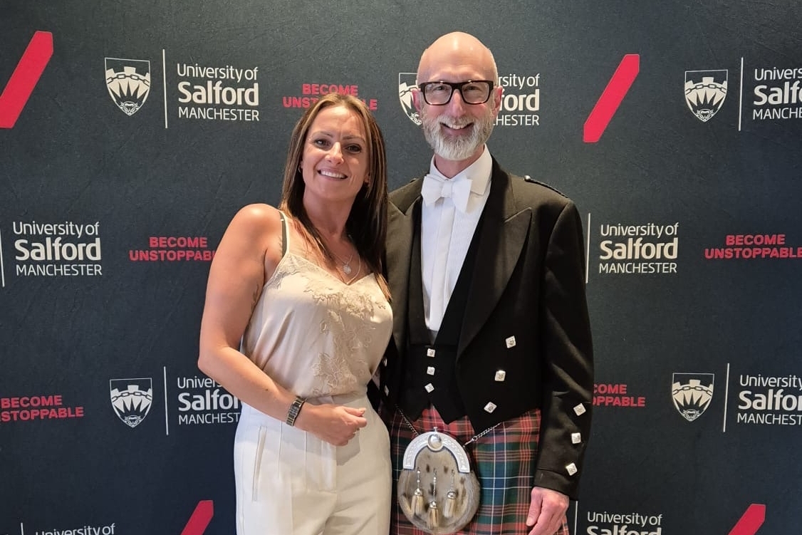 Gail Hadfield Grainger posing for a photo with Vice-Chancellor Nic Beech