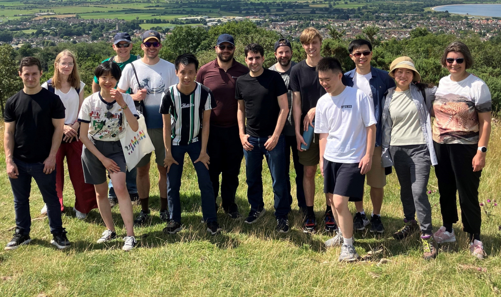 Mischa and his language learning cohort smiling for a group photo