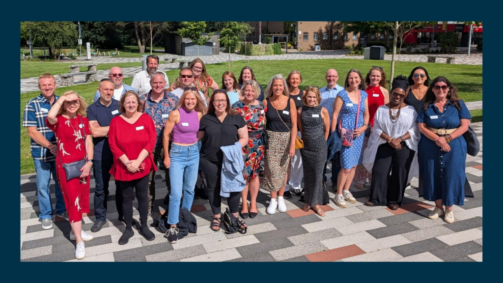 The Environmental Science Class of 1995 posing for a group picture on campus.