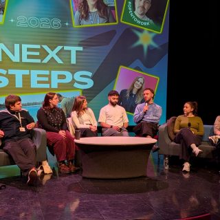 A group of alumni speaking at the Next Steps event
