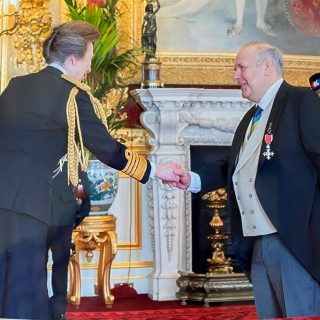 Richard Ikin receiving his MBE