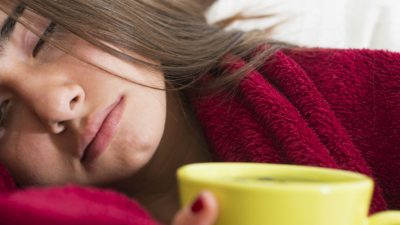 Young woman feeling ill