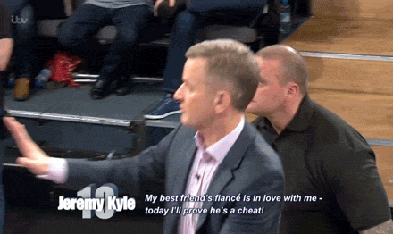Someone trying to punch Jeremy Kyle on his TV show