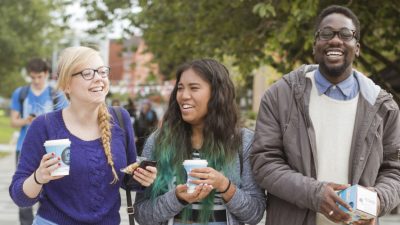 3 students at an open day