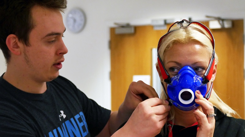 Rebecca being fitted with an oxygen mask