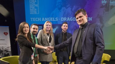 Lavinia shaking hands with the Tech Angels judging panel