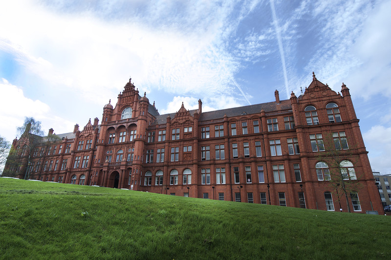 Peel Building with blue cloudy sky above