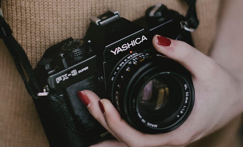 Image: Film camera in womans hand