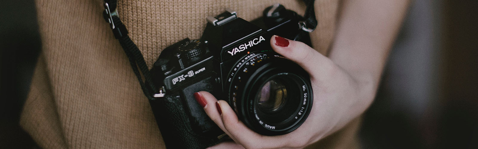 Image: Film camera in womans hand