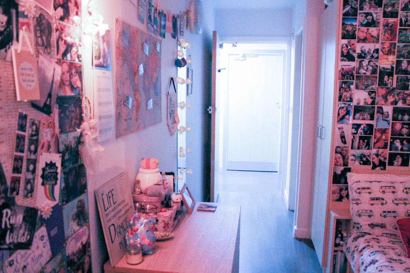 Seren's bedroom with lots of photos covering the walls