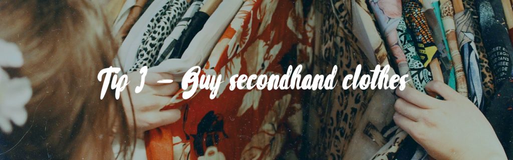 The background image shows someone looking through a rack of colourful clothes on hangers. The image source is Photo by Becca McHaffie on Unsplash. In the foreground there is text that says 'Tip 3 - Buy secondhand clothes'
