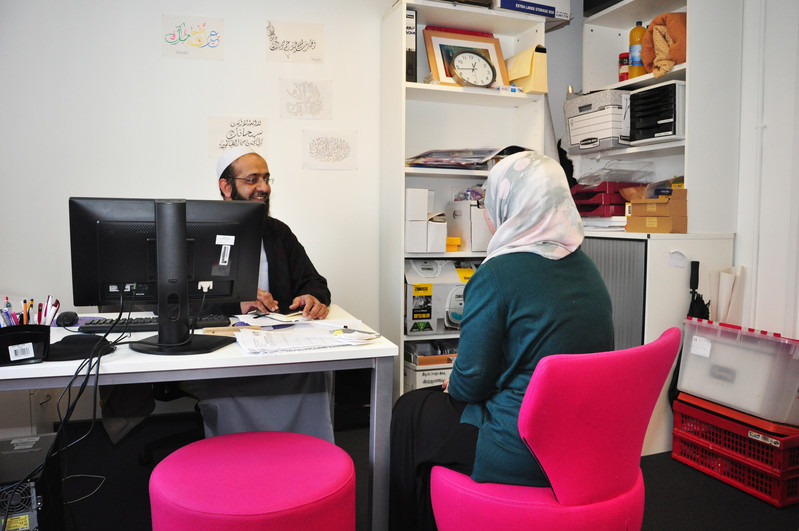 Student having a meeting with Imam Rashid Musa