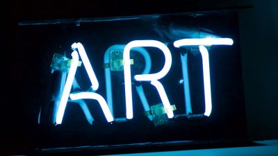 Photo of "Art" neon light sign