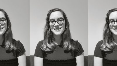 Black and white headshot of Ellie