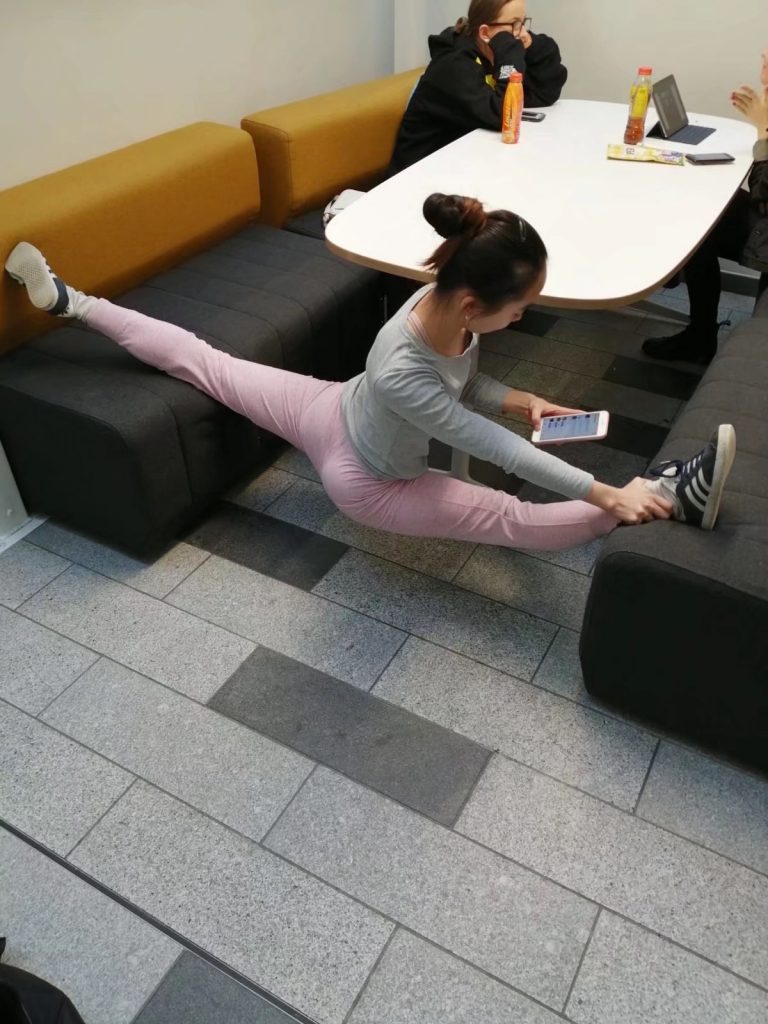 Wenwen MA Dance student doing the splits