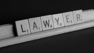 Image of the word "Lawyer" spelt out with scrabble pieces