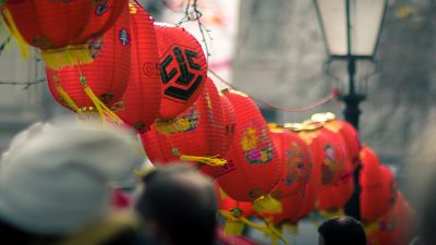 Photo of red lanterns in-between the street lamps