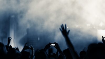 Photo of people raising their hands