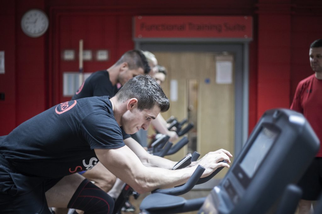 Students using exercise bikes in the Sports Centre gym