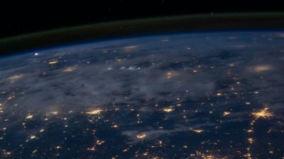 Photo of earth from space during night with city lights