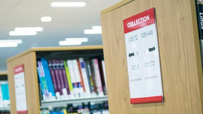 photo of books on library shelves
