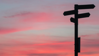 Cross roads with a red sky in the background