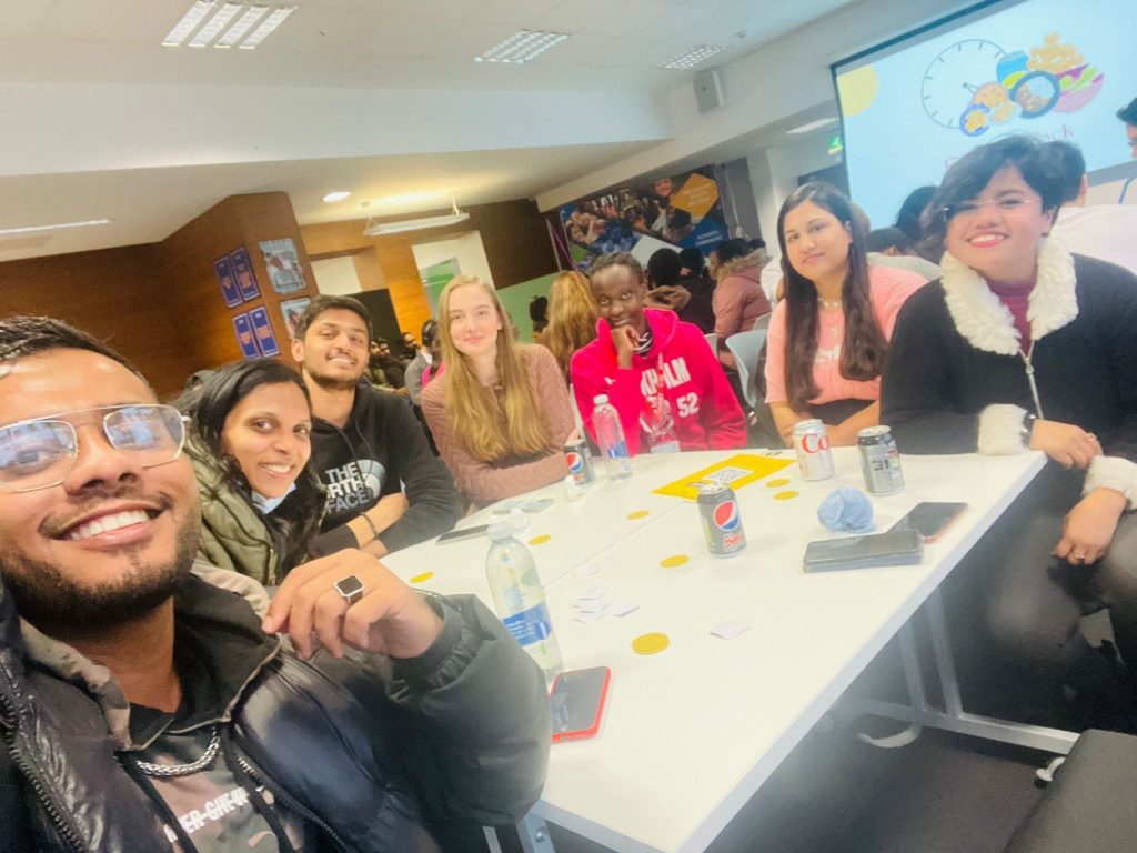 Sana and her friends having fun at the international student engagement event at the University of Salford Students' Union.