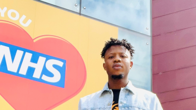Cropped Photo of a man standing infront of the Mary Seacole Building