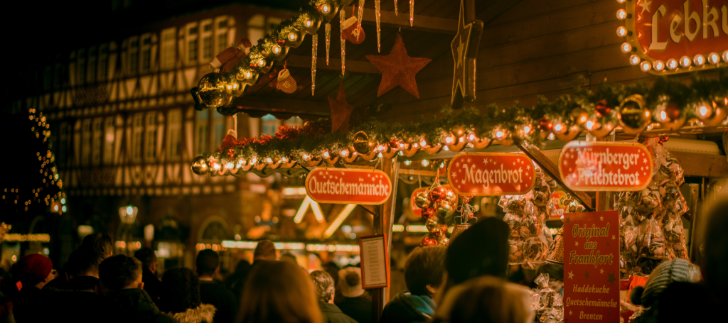 People exploring Manchester Christmas Markets.