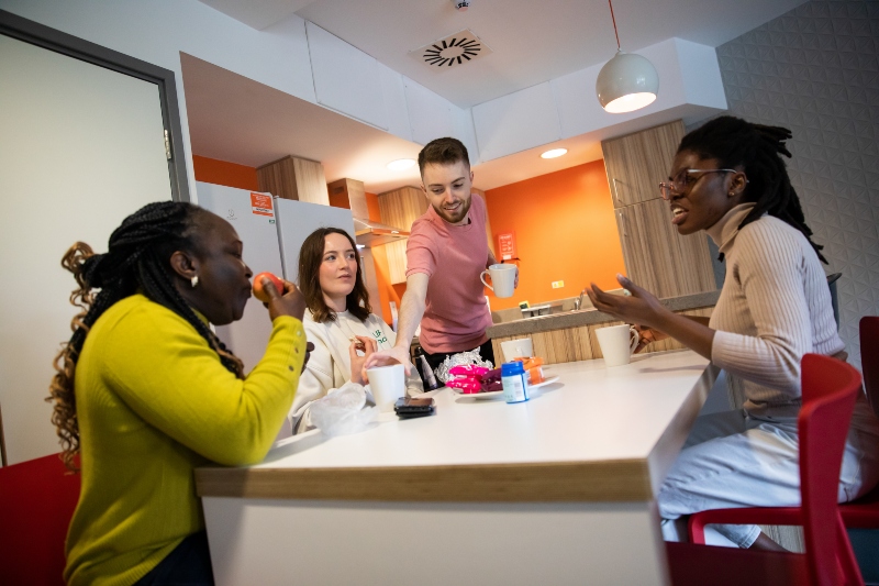 Catching up with friends in the kitchen