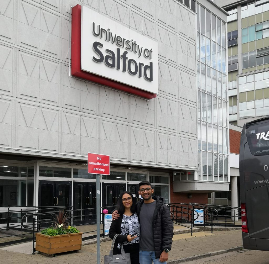 Prathmesh with his mum outside Maxwell building on Salford's Peel Park campus