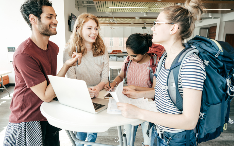 Group of young people chatting and planning