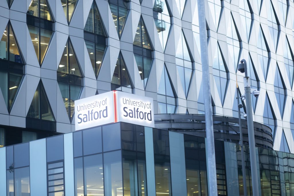 University of Salford sign above the entrance to the MediaCity campus